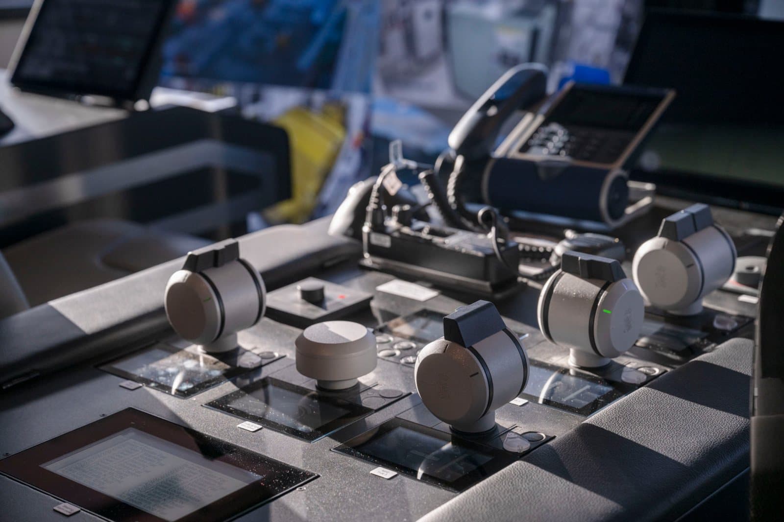 The bridge on one of Norwind's vessels, with the consoles and the forward windows