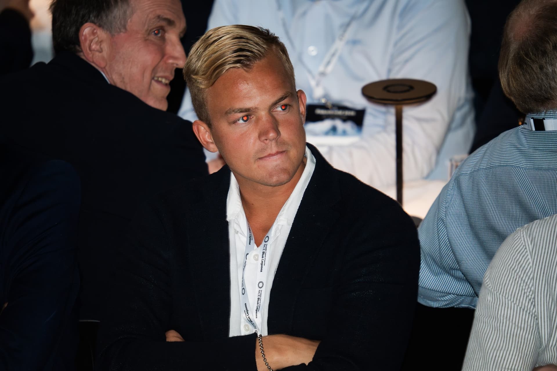 Anders Johann Dyb in a dark jacket at a table during Fiskarkveld in Atlanterhavsparken